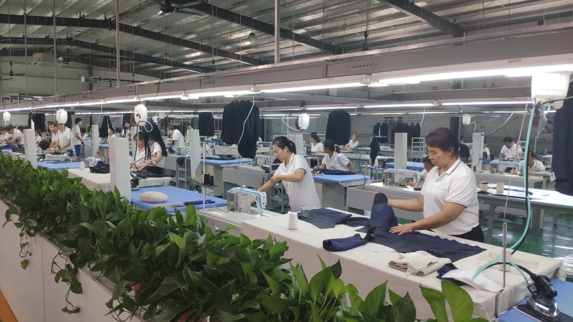 学习运用“千万工程”经验，推动服装加工产业转型升级